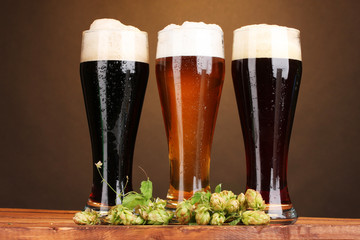 three glasses with different beers and hop