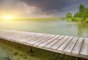 Wooden pier on beautiful lake.Nature composition.