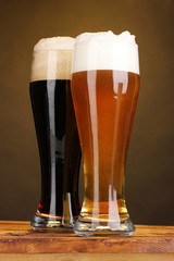 black and golden beer in glasses