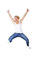 Fototapeta na wymiar Young happy caucasian woman jumping in the air