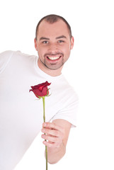 Young man with flower in hand