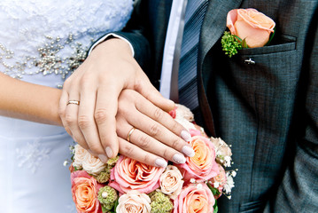 hands of bride and groom