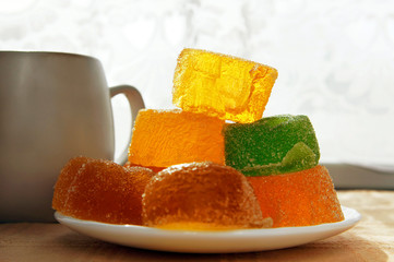 Fruit candy on a white plate