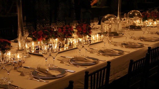 Elegant candlelight  dinner table setting at reception