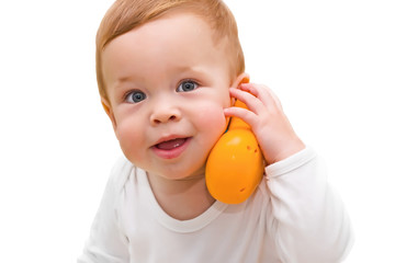 The one-year-old kid speaks by phone