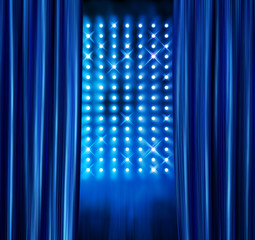 Stage spotlights blue curtains