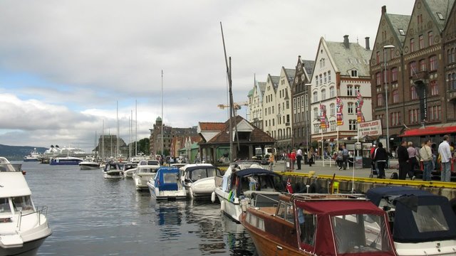 Yachts and motorboats at bay in old Norwegian port, time lapse