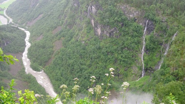 Waterfall in misty mountains near Stalheim, time lapse