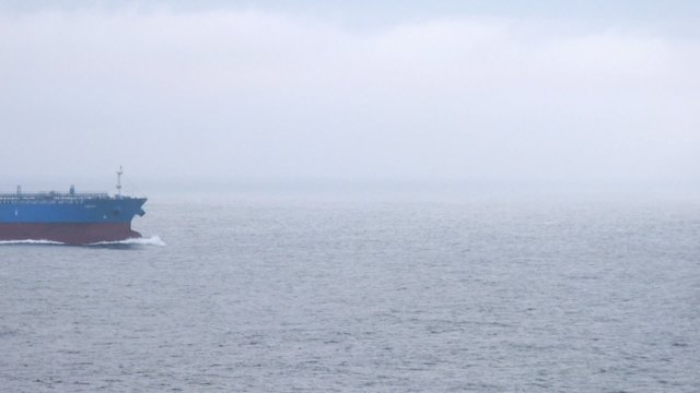 Tanker ship left behind by cruise liner