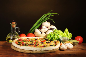 delicious pizza, vegetables and spices