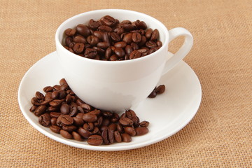 Fototapeta premium Coffee Bean and cup with linen background