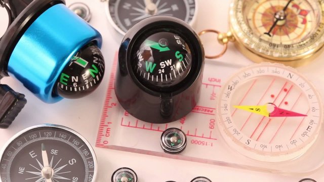 Twelve different compasses - vintage, plastic compass and other