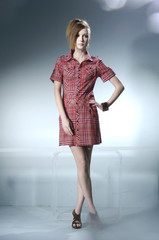 Portrait of a styled professional model on light background