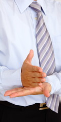 Stop hand gesture by business man