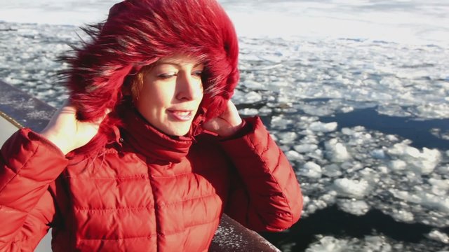 Beautiful woman smile and stand on board at winter