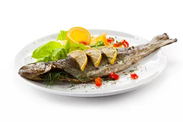Crédence de cuisine en verre imprimé Plats de repas Fish dish - roast trout and vegetables