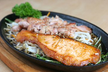 Grilled chicken and fish in terriyaki sauce
