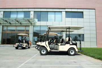 storage battery cars before the buildings