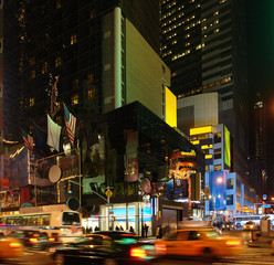 city life with Times Square at night