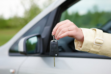 Hand with car keys