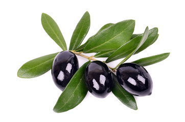 Black olives with green leaves isolated white background