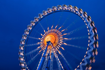 Illuminated Ferris wheel at the oktoberfest