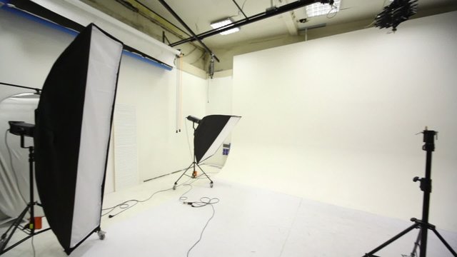 White background inside studio light room with lamps