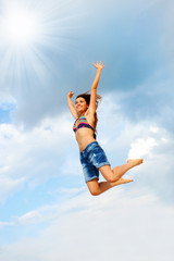 Beautiful Woman over blue Sky