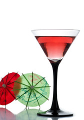 A drink and two cocktail umbrellas