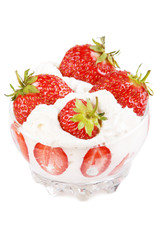 Vase of strawberries with cream