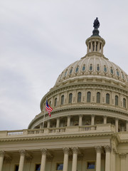 Obraz premium US Capitol Building in Washington DC with American Flag