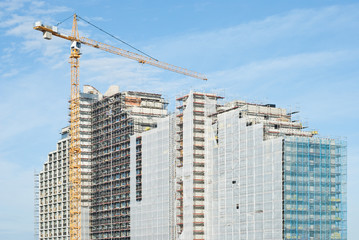 Fototapeta na wymiar Construction Site with Large Crane
