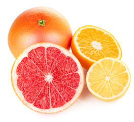 fresh fruits orange lemon grapefruit in cut isolated on white