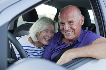 happy elderly driving