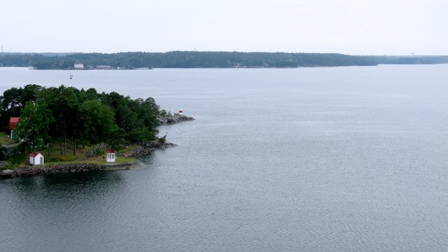 Little islands in Stockholm bay, view from ship deck, time lapse