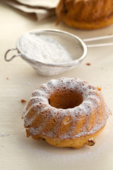 Cupcake with raisins, sprinkled with powdered