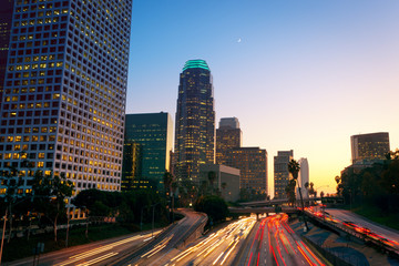 Fototapeta premium Los Angeles, Urban City at Sunset with Freeway Trafic