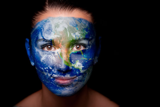 Girl with a painted map of World on his face.