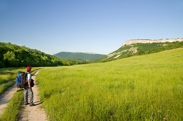 Man tourist in mountains.