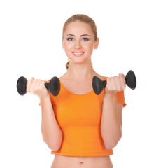 Young smiling woman with dumbbells