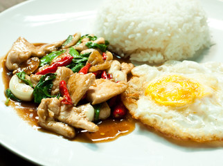 fried basil chicken and fried egg