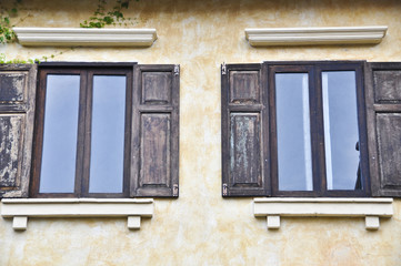 Italian style building with twin windows.