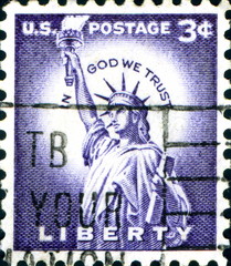 In God We Trust. Liberty. US Postage.