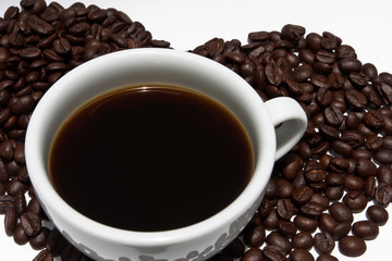 Coffee beans and cup