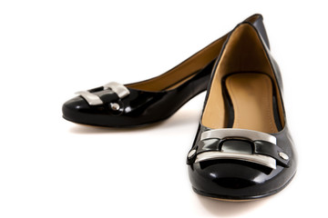 Black stylish leather female shoes on white background
