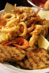 Fried fish and squids in isola di San Pietro Sardinia Italy