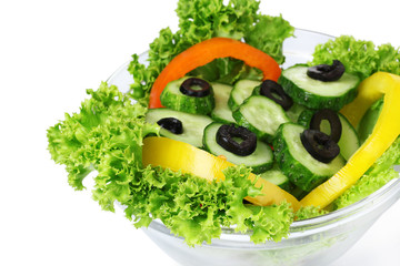 vegetable salad on plate isolated on white