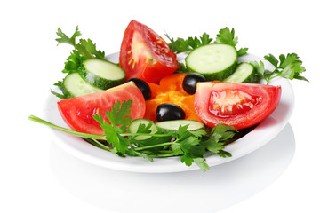 vegetable salad on plate isolated on white