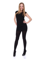 Fototapeta premium young woman in black dress. Isolated over white background.