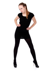 Fototapeta premium young woman in black dress. Isolated over white background.